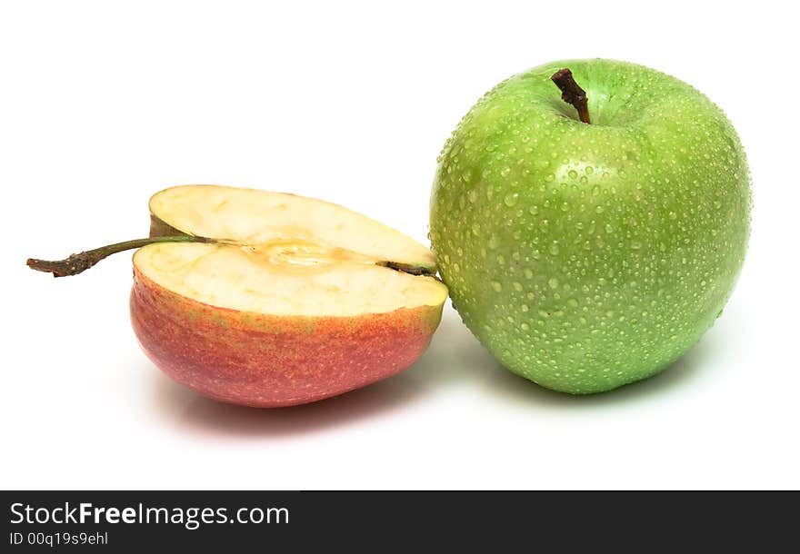 The whole green and half of red apple on white. Isolation on white. Shallow DOF. The whole green and half of red apple on white. Isolation on white. Shallow DOF.