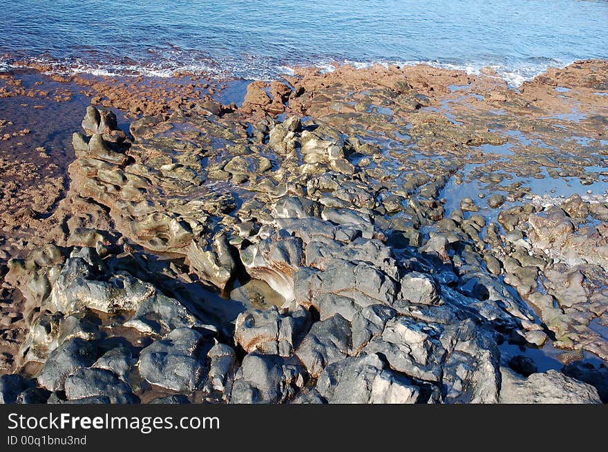 stiff lava on the beach in tenerife. stiff lava on the beach in tenerife