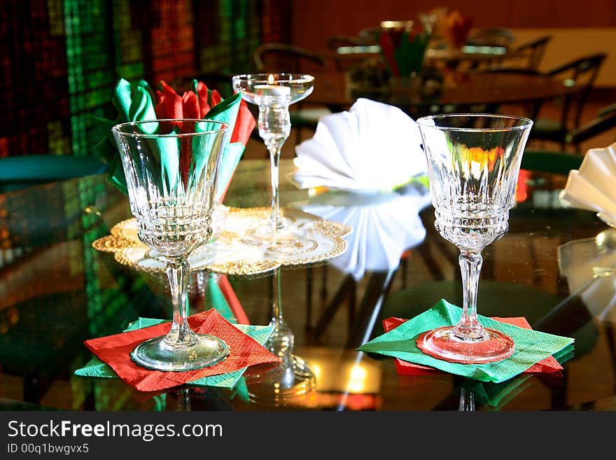 Simple resaurant setup with two glasses and candle