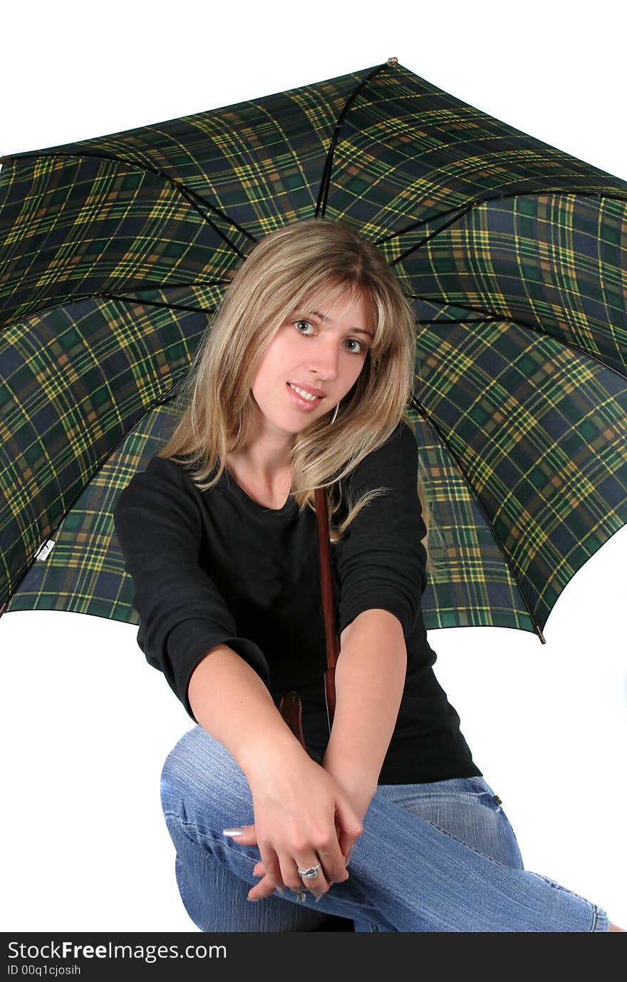 Beauty blonde girl with an umbrella on white background