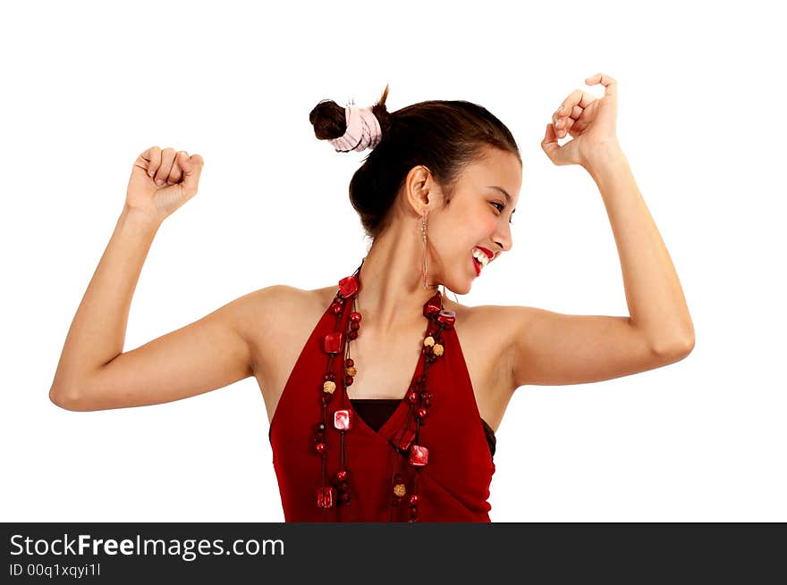 Attractive woman in red dress dancing on a white background