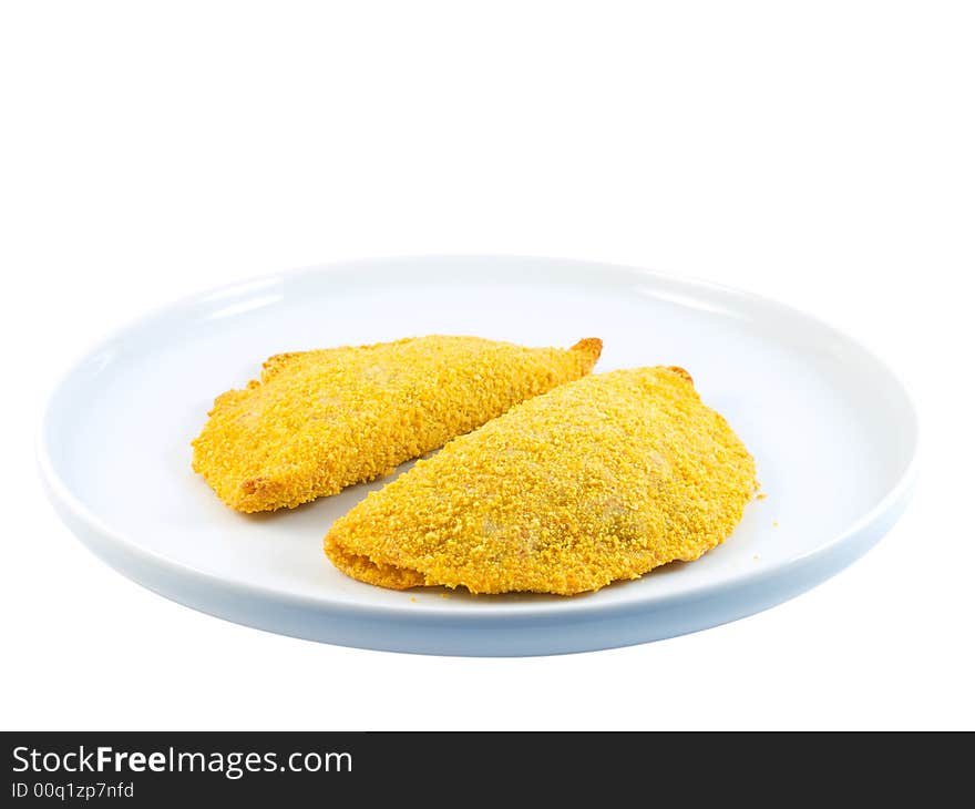 Crispy golden pancakes on a white plate isolated on white background. Crispy golden pancakes on a white plate isolated on white background