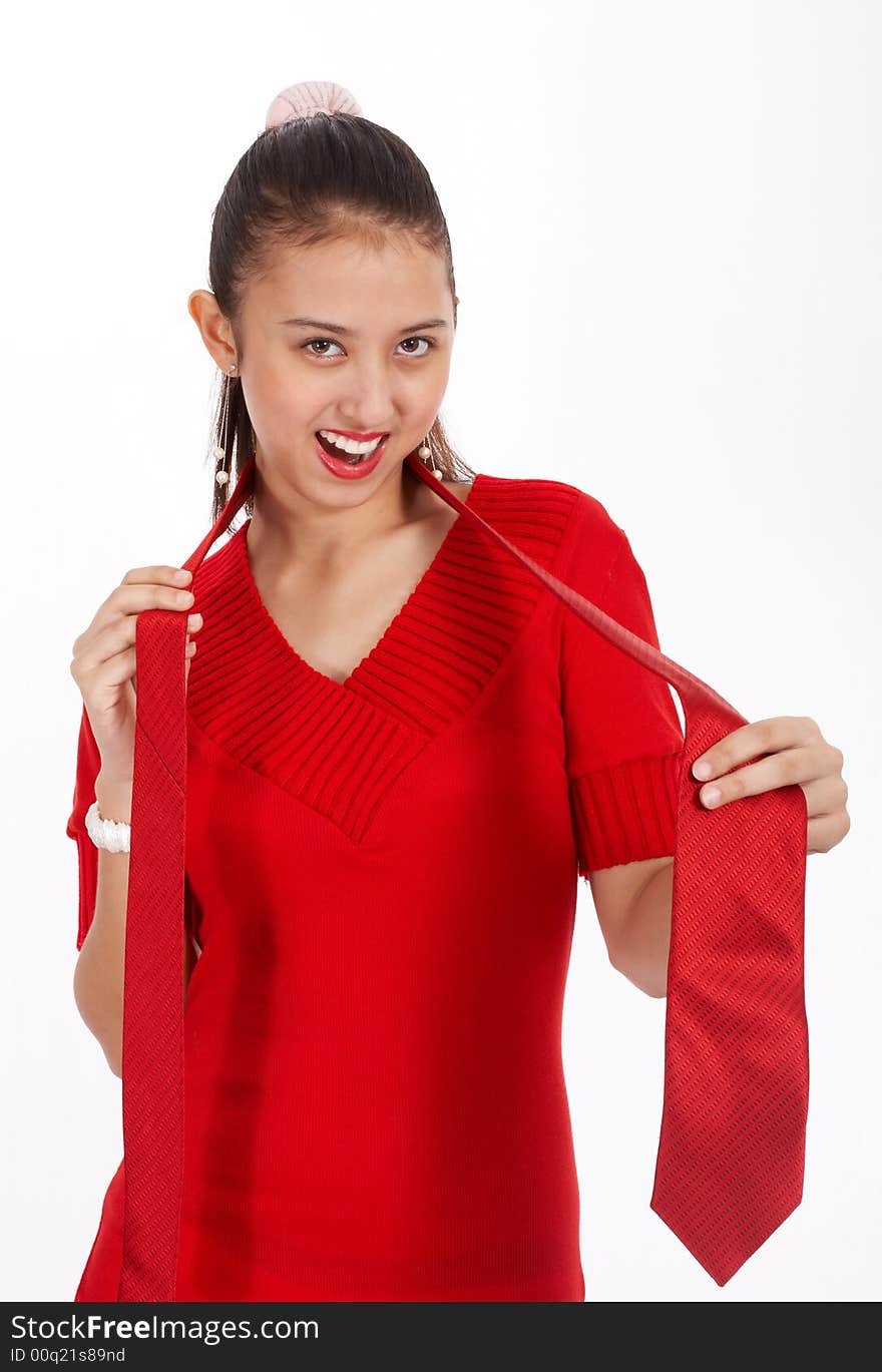 Smiling beautiful lady on red dress holding necktie. Smiling beautiful lady on red dress holding necktie