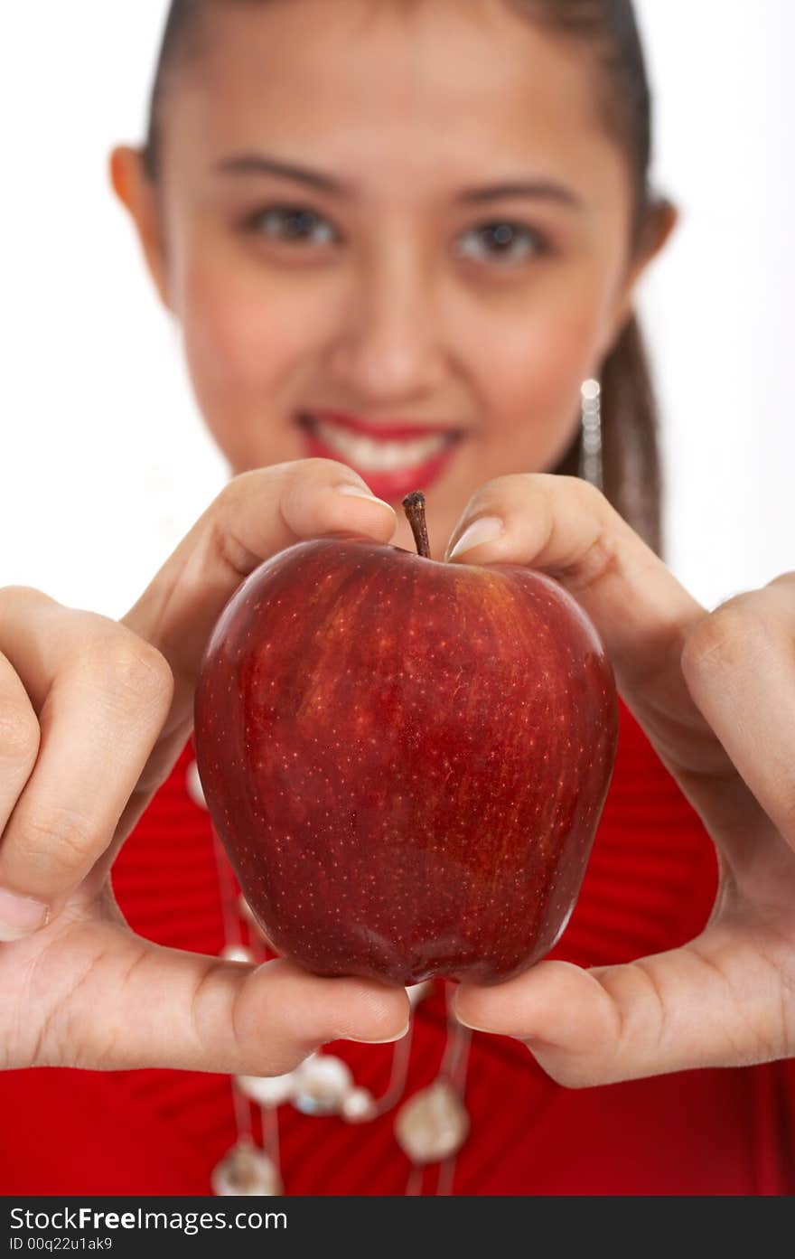 Lovely lady holding juicy red apple. Lovely lady holding juicy red apple