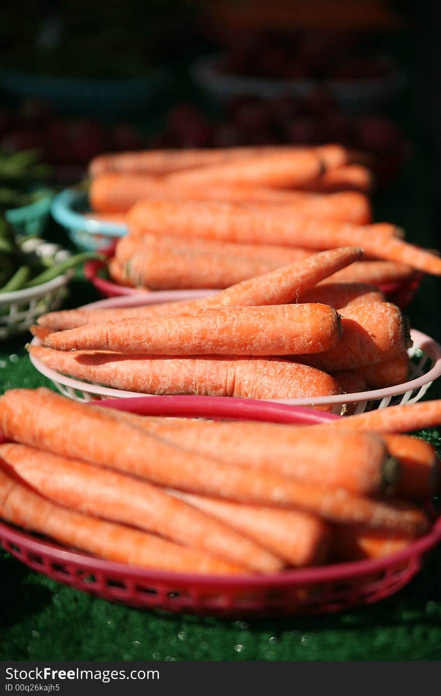 Baskets of carrots at the farmer's market