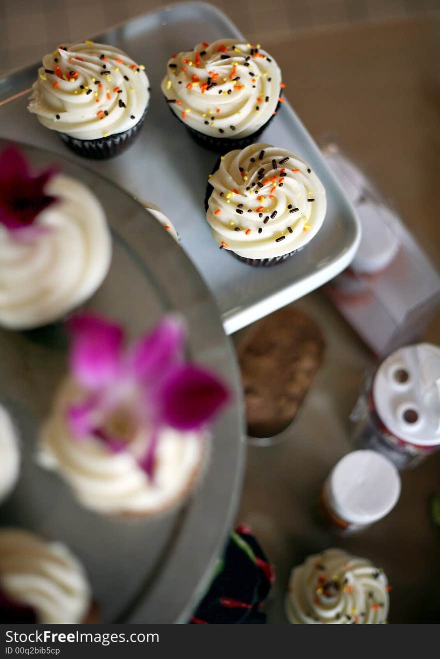 Fancy cupcakes with orchid blossoms