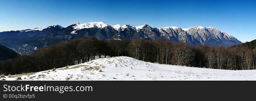 Bucegi Mountains, seen from Cumpatu ridge (over the Prahova Valley), near a shepherd house