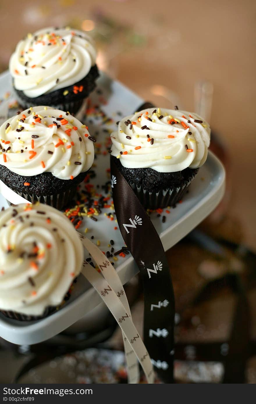 Fancy cupcakes with orchid blossoms