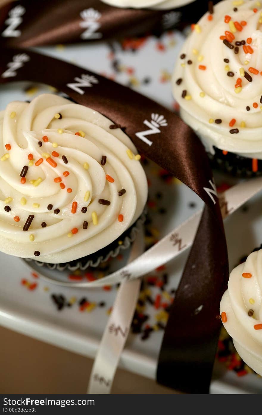 Fancy cupcakes with multi-colored sprinkles