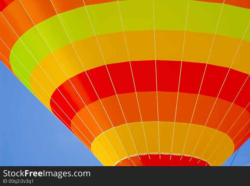 Hot air balloon on the blue sky. Hot air balloon on the blue sky