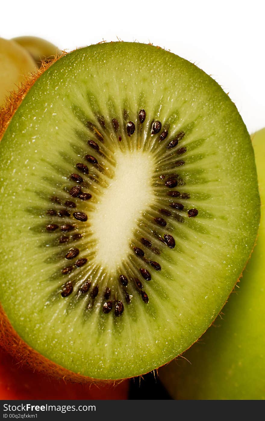 Close-up details of cut through kiwi pulp with seeds. Close-up details of cut through kiwi pulp with seeds