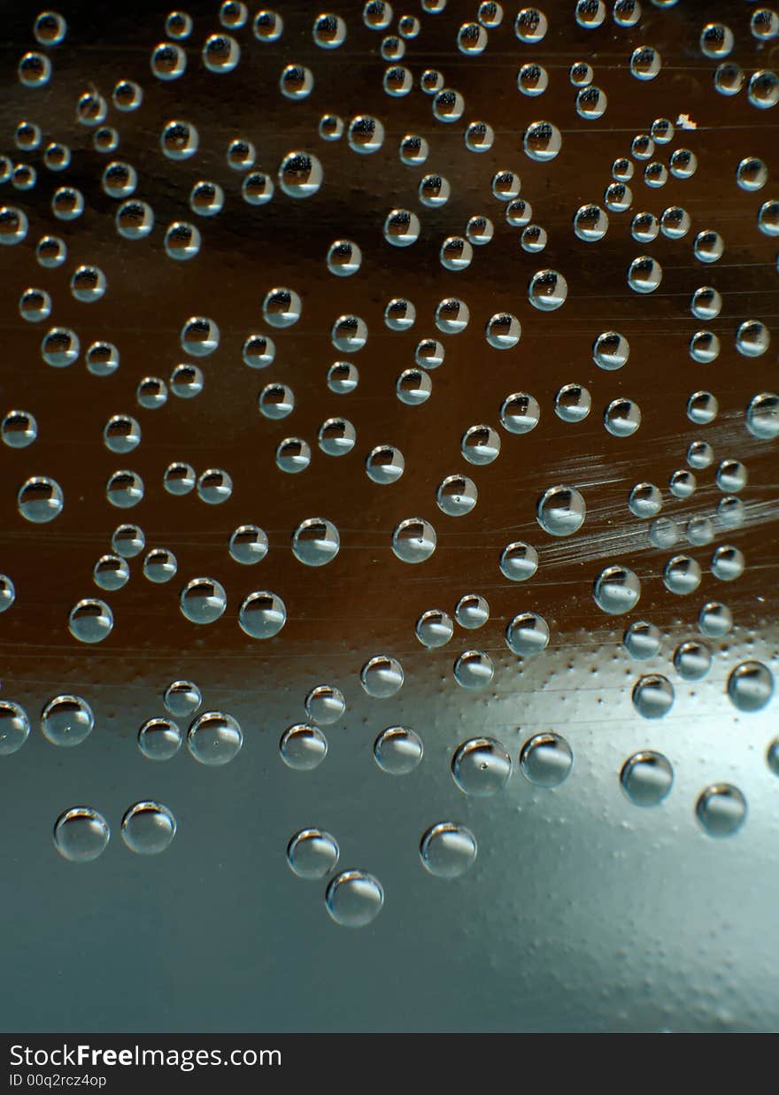 Bubbles inside liquid on dark background