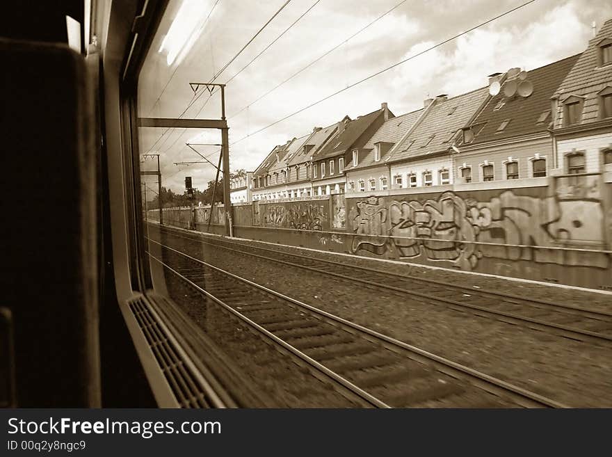 A picture taken from a moving train, outside koln. A picture taken from a moving train, outside koln.