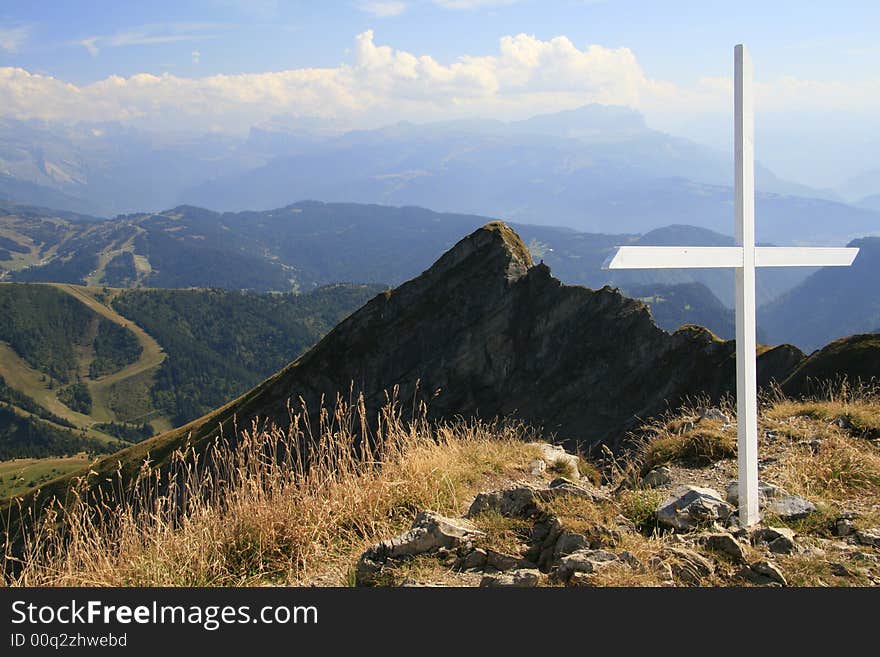 A cross on a high alpine ridge in France. A cross on a high alpine ridge in France.