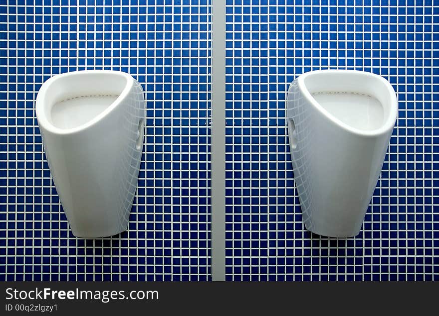 Clean toilet for man with blue background. Clean toilet for man with blue background