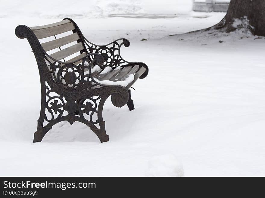 Wrought Iron Bench In The Snow