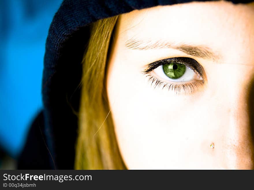 Amazing green eye in closed portrait