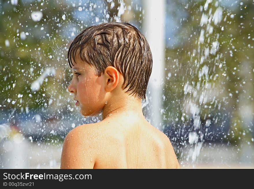 Boy playing with water