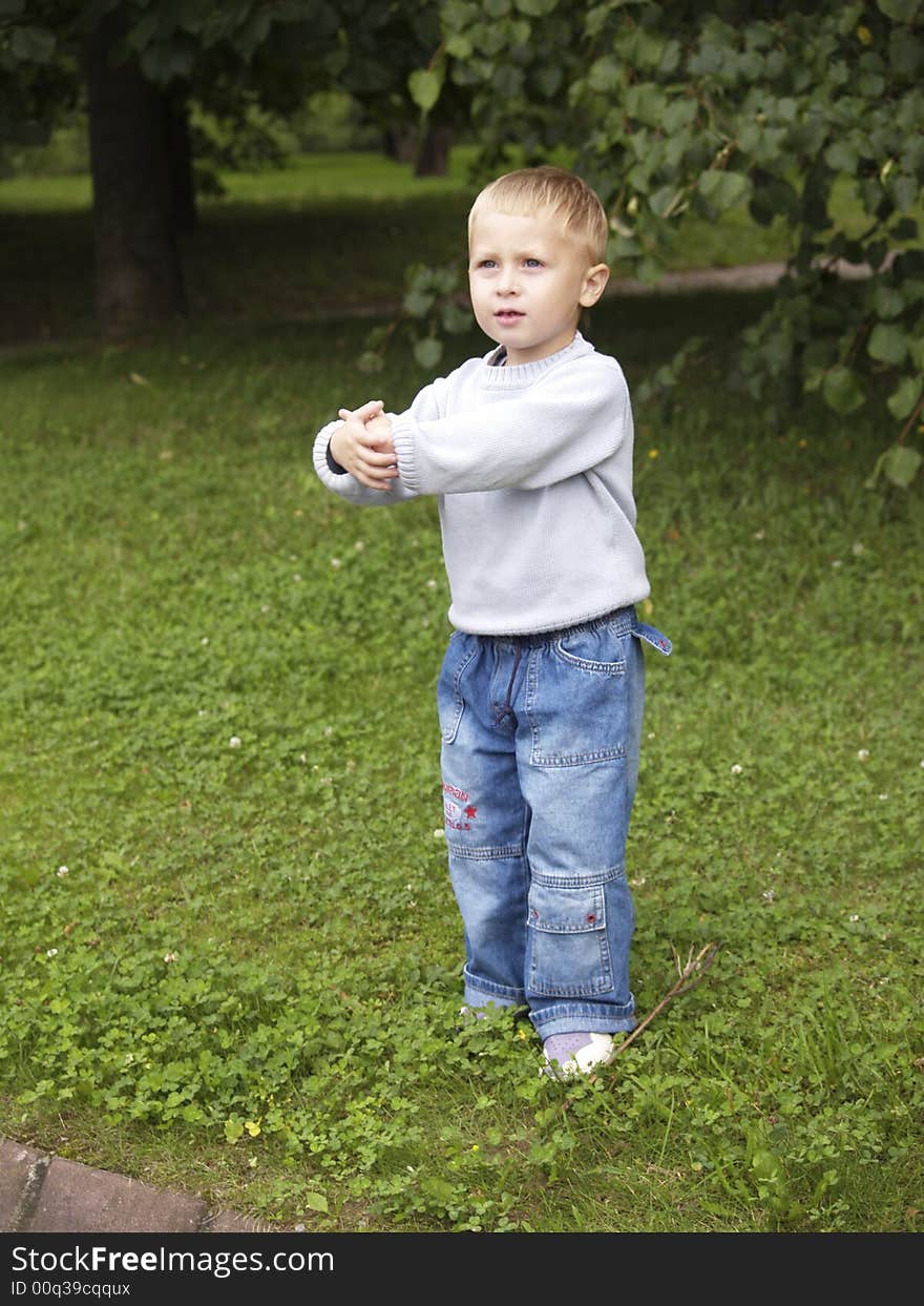 Child plays in the park. Child plays in the park