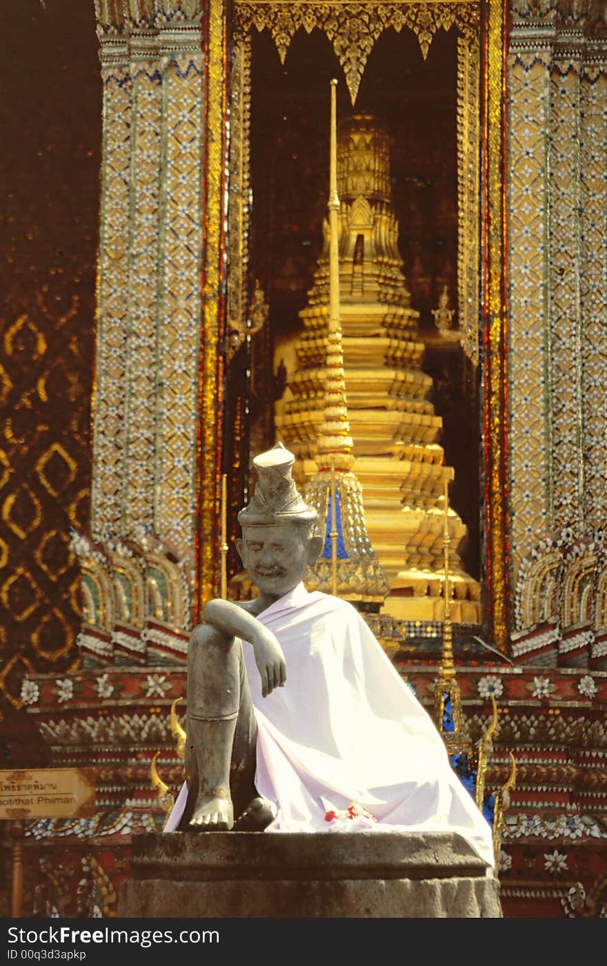 Buddhistic temple keeper statue