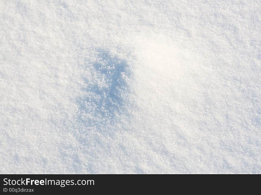 Fresh snow sparkle in the sun. Snow background.