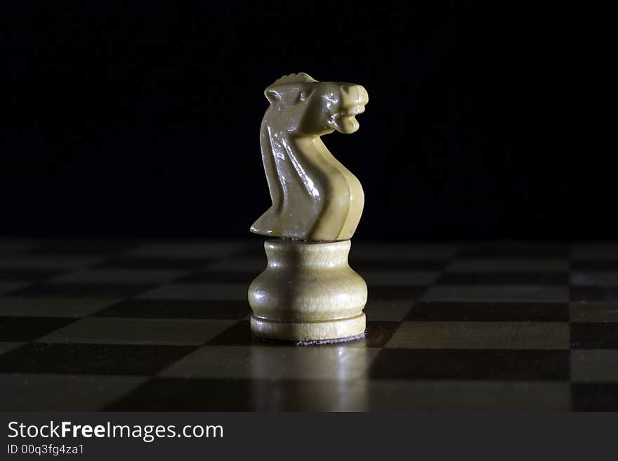 Chess figure on a chess board