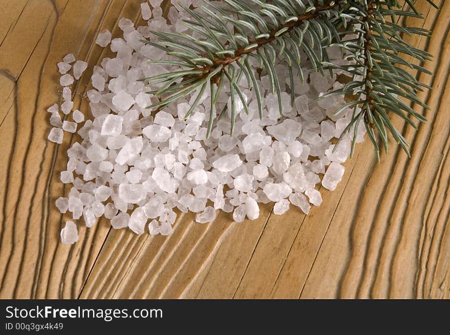 Pine bath items. sea salt with fresh branch on the old wood. Pine bath items. sea salt with fresh branch on the old wood