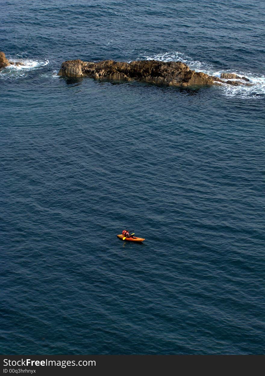 Kayaker on the trip around the coast