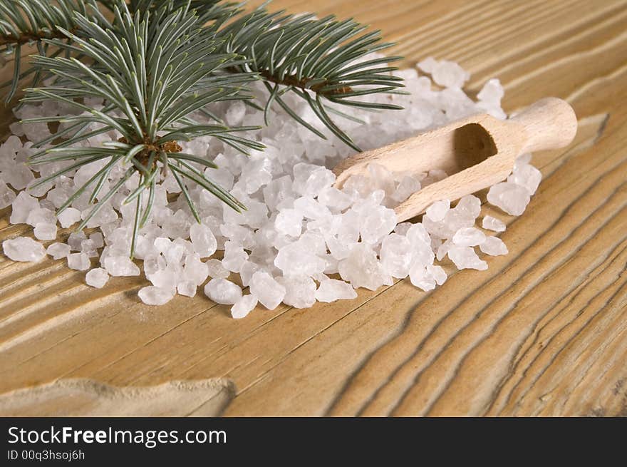 Pine bath items. sea salt with fresh branch on the old wood. Pine bath items. sea salt with fresh branch on the old wood