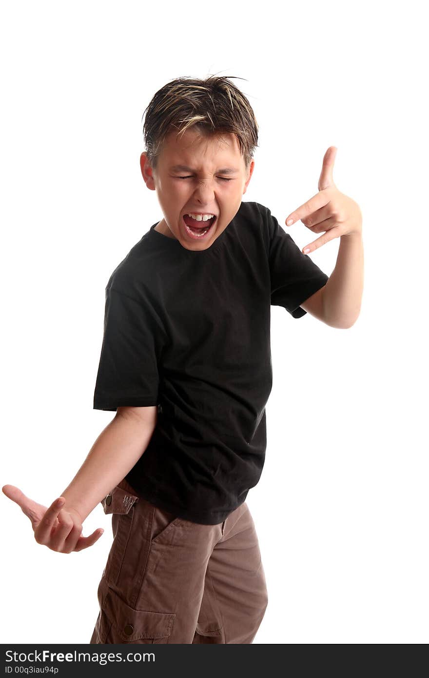 Expressive boy feeling the music and making a rock n roll hand gesture, (coma signal) on a white background