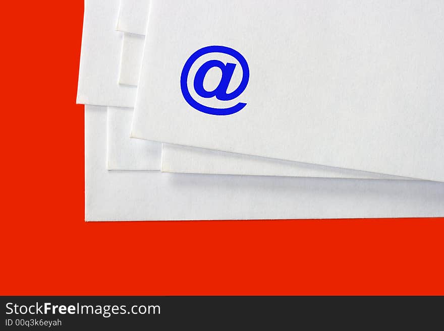 Stack of e-mail letters, isolated on red background