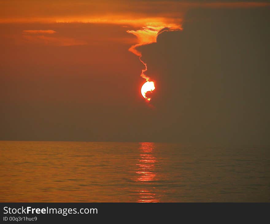 Red and cloudy ocean sunset. Red and cloudy ocean sunset