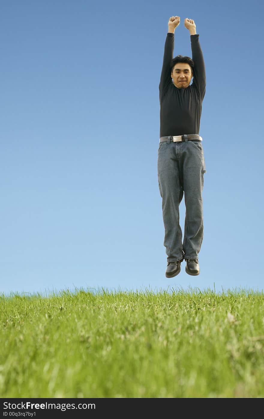 Shot of a man jumping up with joy. with copyspace. Shot of a man jumping up with joy. with copyspace