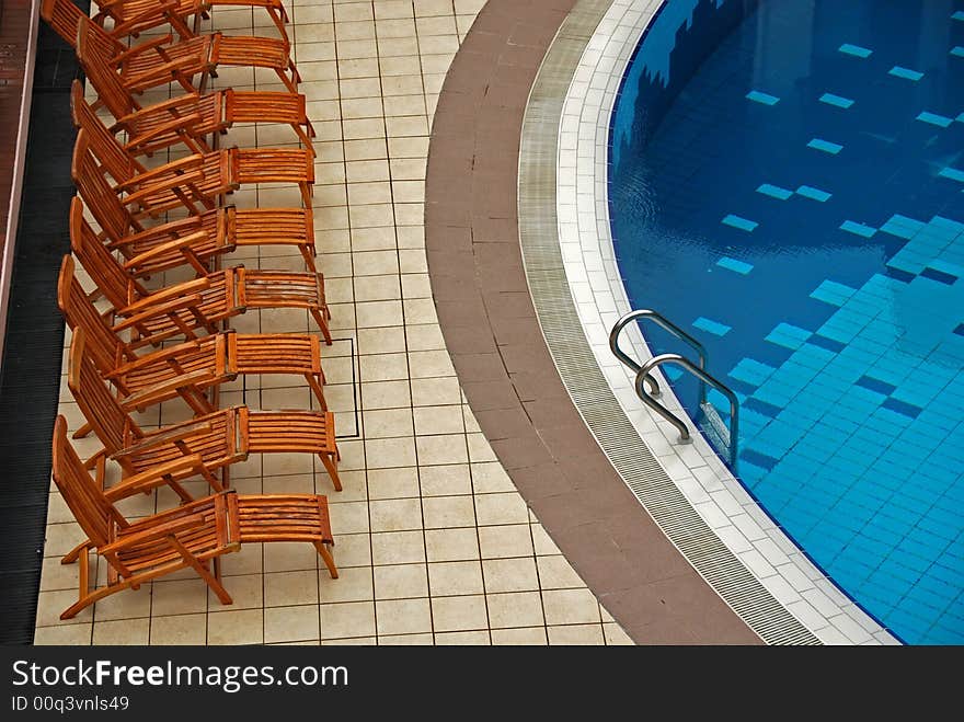 Chair and swimming pool inside the hotels