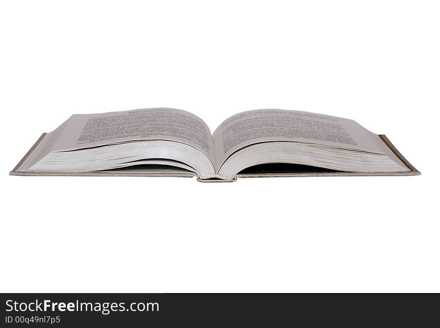 A book with gray book cover is opened in the middle. A book with gray book cover is opened in the middle.