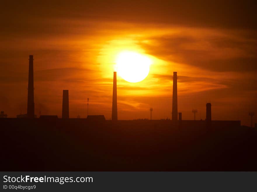 City sunset with a view of factories. City sunset with a view of factories