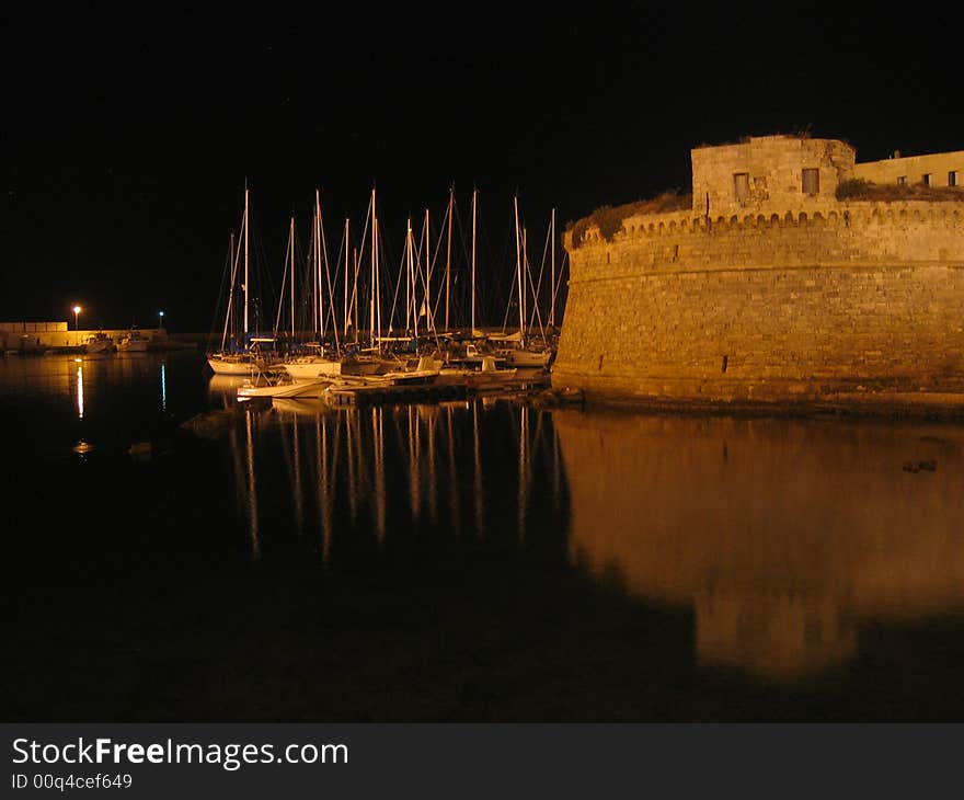 Sailboats at night in a really quiet moment. Sailboats at night in a really quiet moment