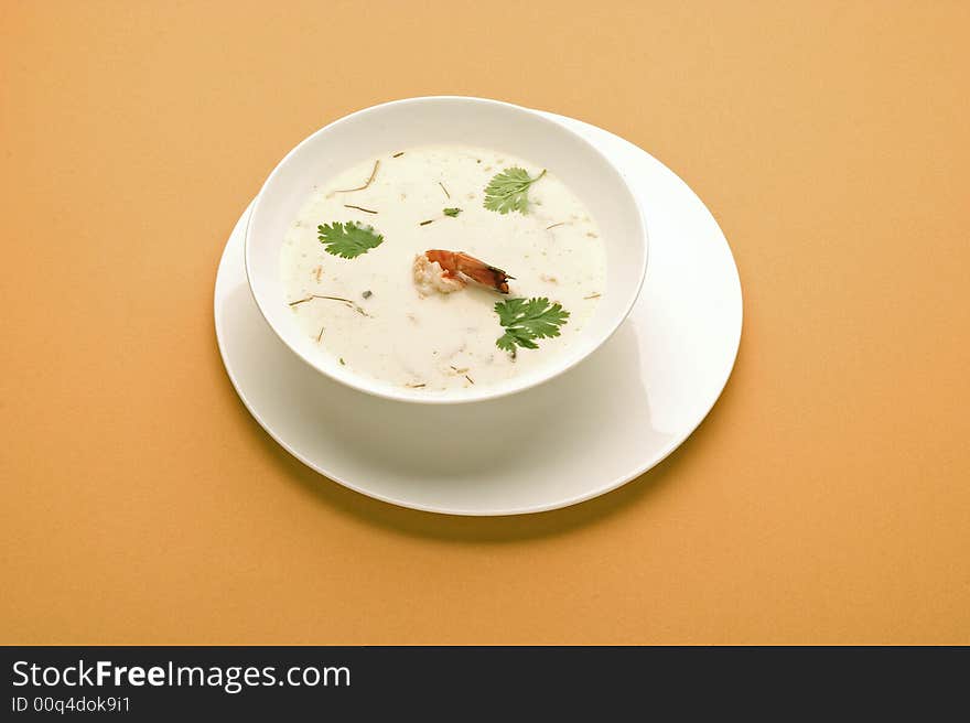 Shrimp soup in white bowl