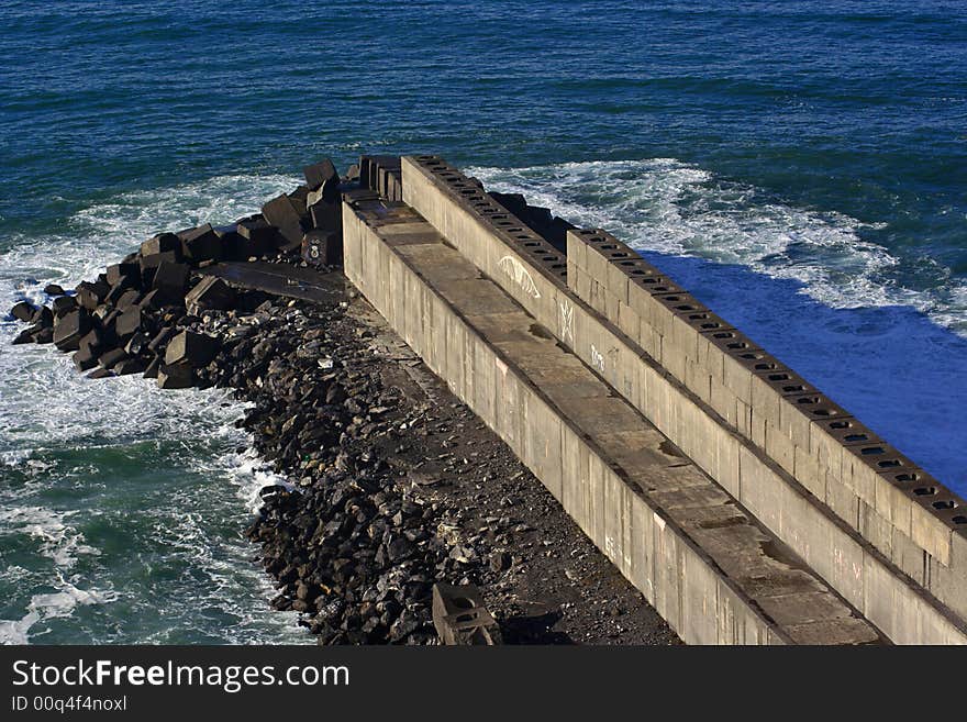 An image of a Jetty construction in the sea