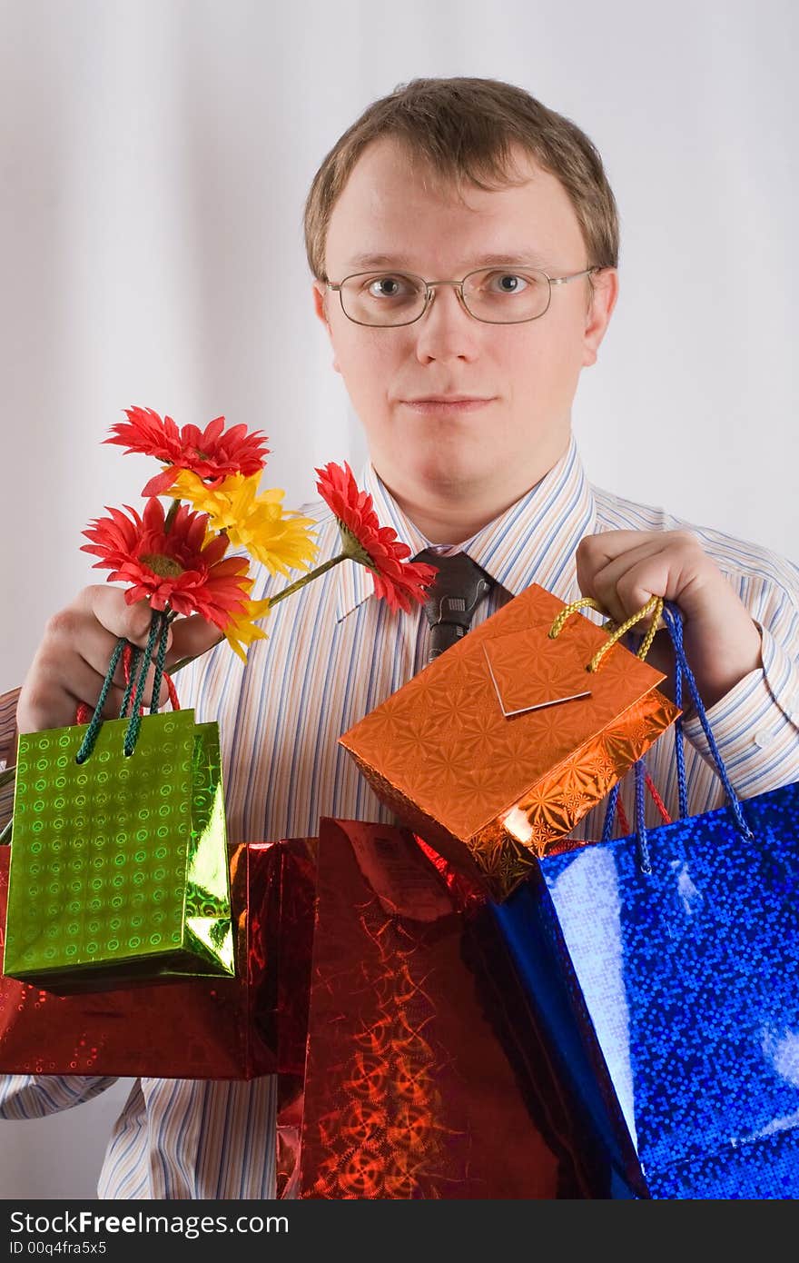 The man with presents and flowers