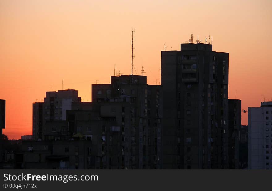 Sunset over New Belgrade blocks with anntena`s. Sunset over New Belgrade blocks with anntena`s