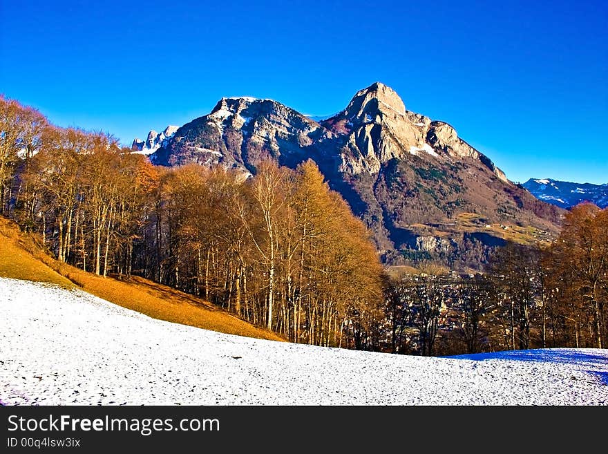 Country landscape with fields and mountains. Switzerland