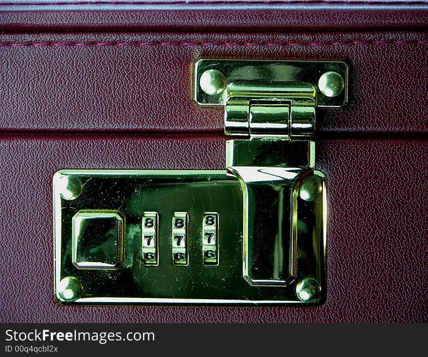 Combination lock on a case of a businessman