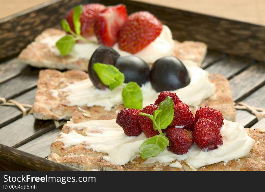 Sandwiches with strawberry and grapes