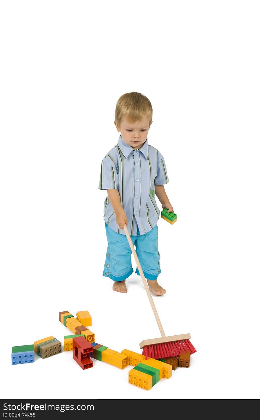 Child makes his playground clean. Child makes his playground clean.