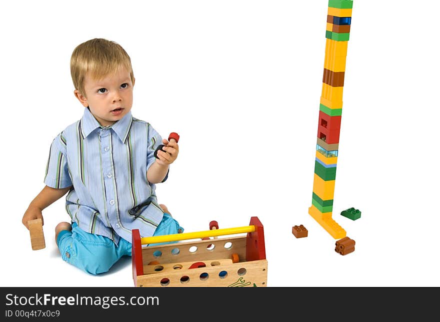 A child plays with his toolbox. A child plays with his toolbox.