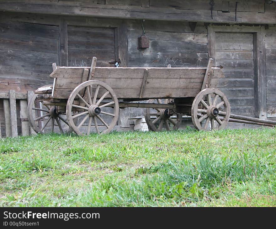 The old coach in front of the house