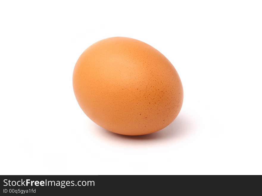 Closeup of a speckled brown chicken egg