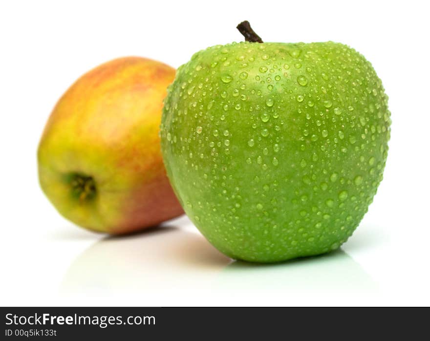 Green and red apples on white. A beautiful real shadow, shallow DOF. Green and red apples on white. A beautiful real shadow, shallow DOF.