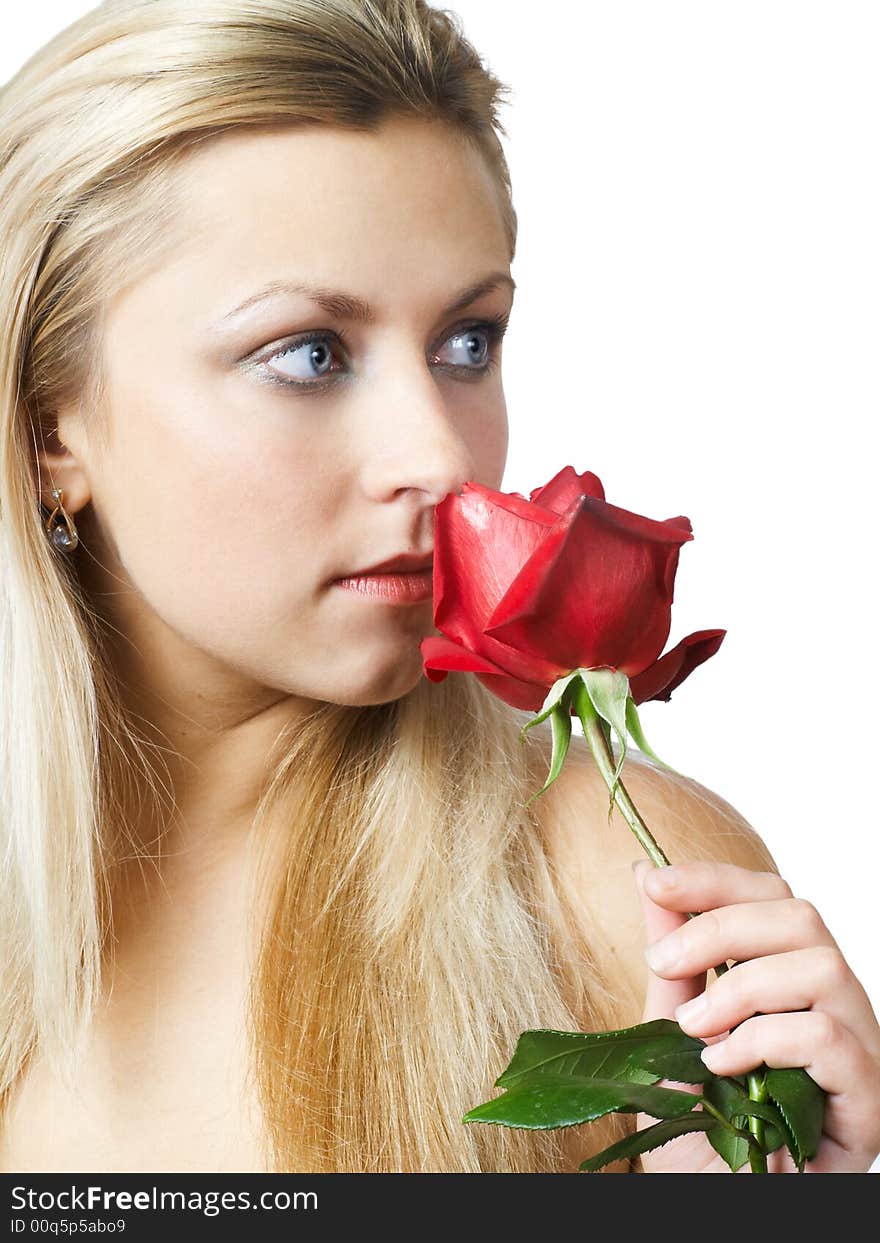 Blonde girl with blood red rose in hands. Blonde girl with blood red rose in hands